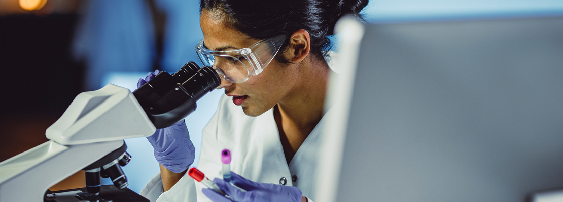 Female forensic expert working in the lab in Edmonton.